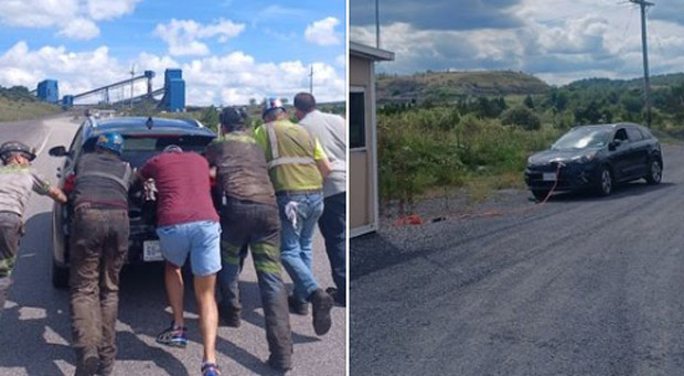 Photo of Coal Miners Pushing Stranded Electric Car Goes Viral
