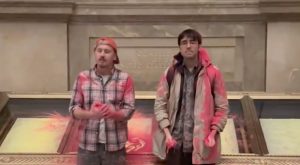 Climate Protesters Arrested after Throwing Pink Powder on U.S. Constitution in Museum