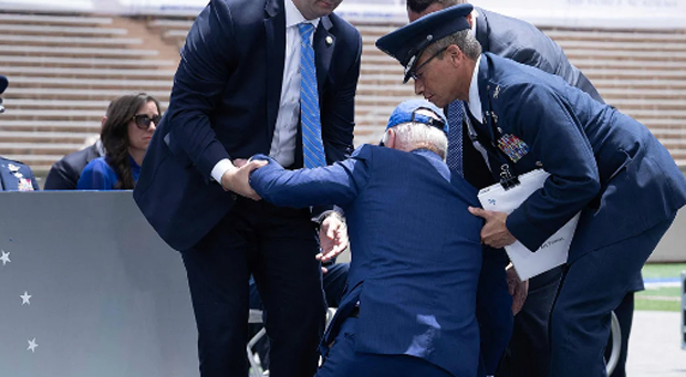 Biden's Handlers Ban Him from Walking Alone in Case He 'Falls Over'